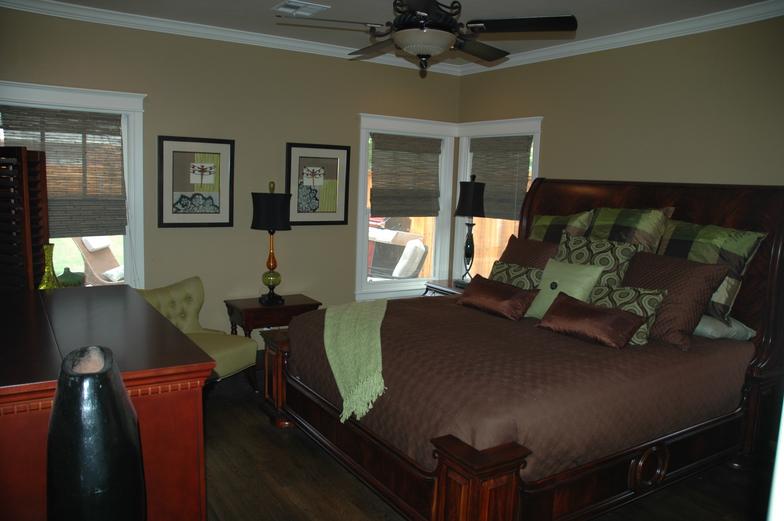 Lime green and dark brown give this master bedroom a modern look.