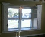 This bedroom window was bumped out to add a window seat and extra storage space.