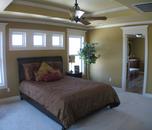 This bedroom is part of the master suite added above the garage.