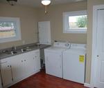 A much needed laundry room was added to the back of this house.